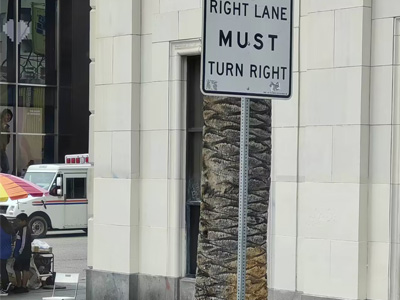 Turn right signs on square sign post